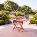 Teak Garden Furniture Spiral 120cm Round Folding Table 4cm Top - Sculptural Folding Teak Dining Table - UK and Ireland garden setting - image 1 Teak Garden Furniture Spiral 120cm Round Folding Table 4cm Top - Sculptural Folding Teak Dining Table - UK and Ireland garden setting - image 1