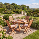 Teak Round to Oval 120-170cm Extending Table 4cm Top (4 Hampton Folding Chairs) - Compact Teak Outdoor Dining Set - UK and Ireland garden setting - image 1