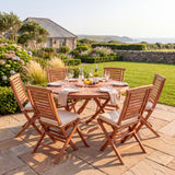 Teak 120cm Round Sunshine Folding Table 4cm Top (6 Folding Chairs) Cushions Included - Premium Teak Garden Furniture Set - UK and Ireland garden setting - image 5